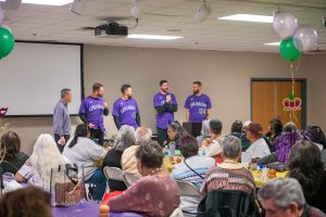 Major League Baseball Players Visit Community Elders