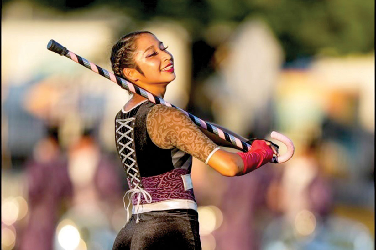 Kennise McGertt Continues Flag Tossing with ASU Marching Band 