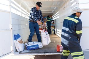 NAGI Foundation, RezHawk Towing, Volunteers Help Provide Pet Food to Community Pet Owners 