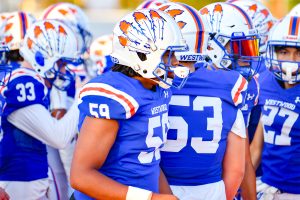 Westwood’s Varsity Football Team Hosts Native American Night for Home Opener